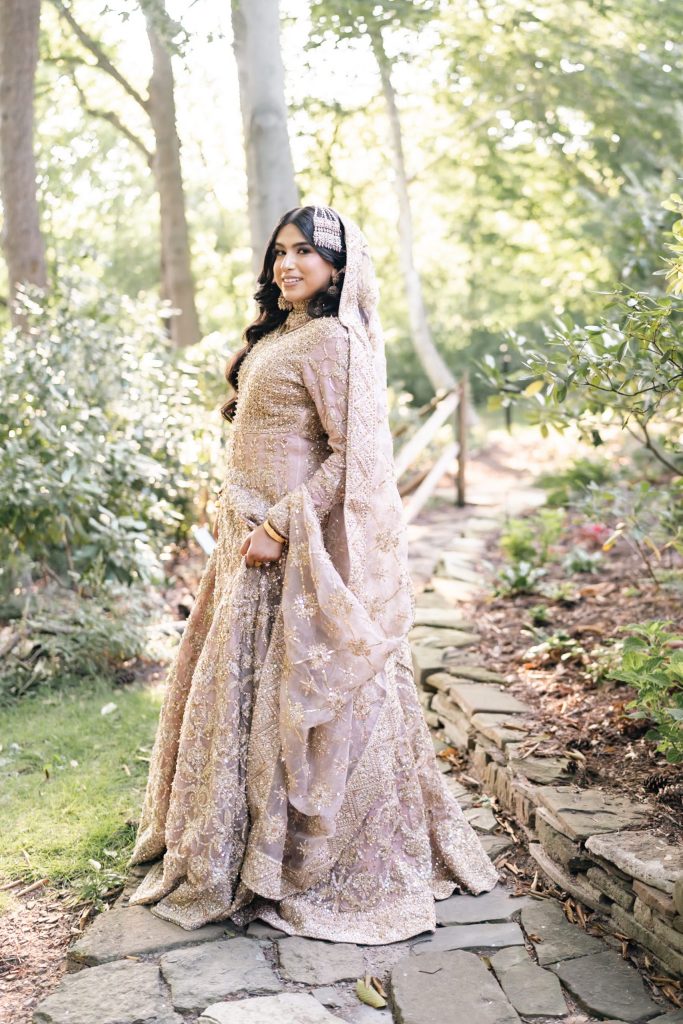 Bride Sana smiling in bridal dress during wedding photoshoot Toronto