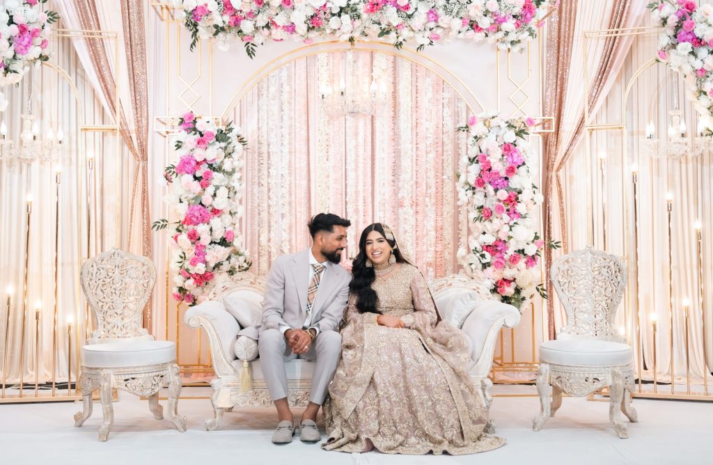 Bride and groom sitting together sharing intimate wedding moment Mississauga